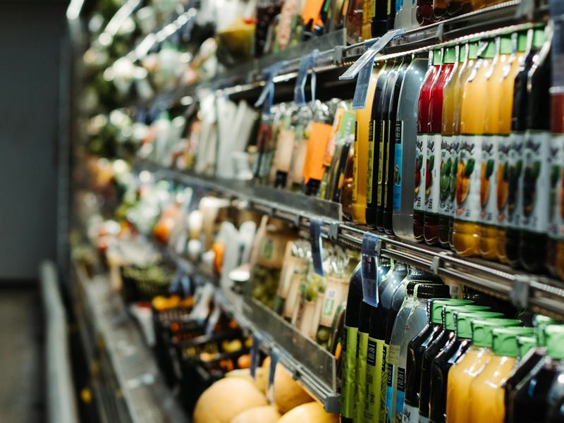 Packaged drinks on a grocery shelf